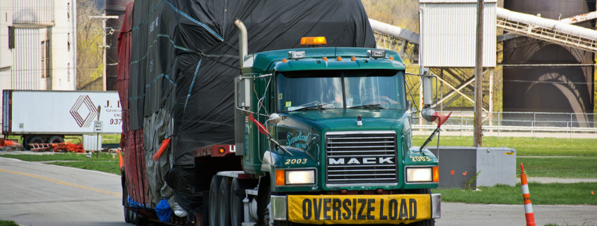 A truck hauling an oversize load.