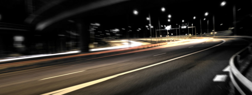 Blurred Image of Highway at Night
